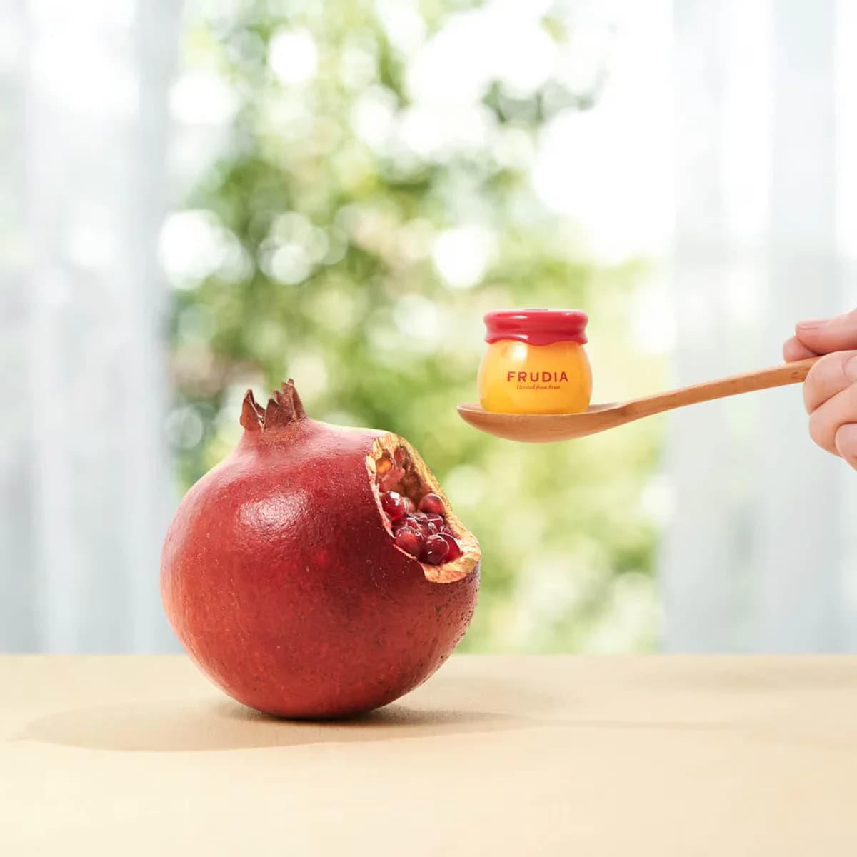 Frudia مرطب شفاه فروديا بنكهة الرمان 10 جم